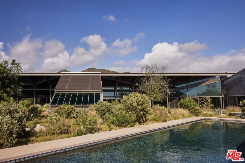 Set on a plateau above Bonsall Canyon in Malibu, this - Beach Home for sale in Malibu, California on Beachhouse.com