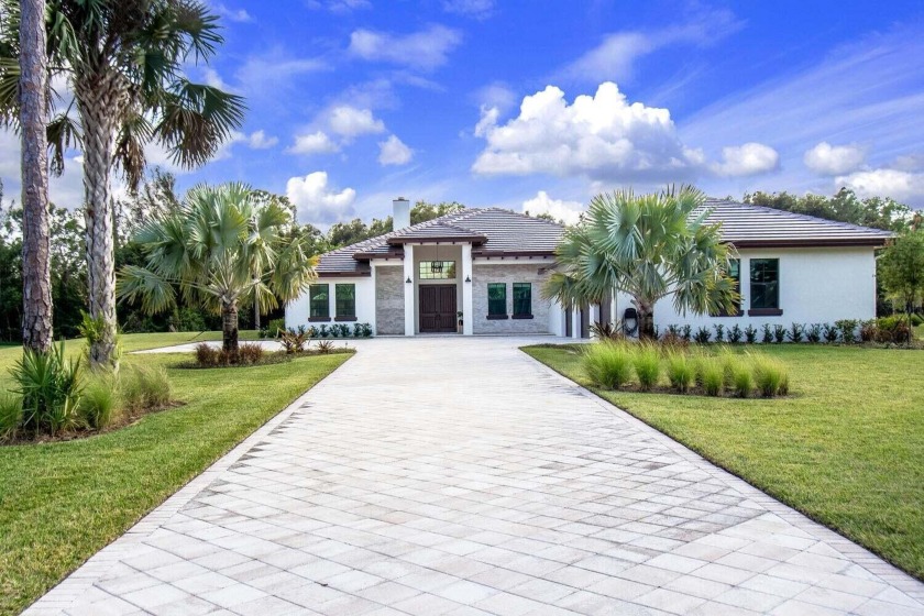 STUNNING NEW CONSTRUCTION home in Bayhill Estates. This CBS home - Beach Home for sale in Palm Beach Gardens, Florida on Beachhouse.com