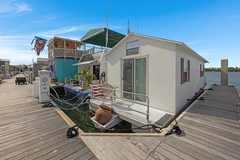 LIVE IN PARADISE AFFORDABLE LIVEABOARD Houseboat & Slip - Beach Lot for sale in Key West, Florida on Beachhouse.com