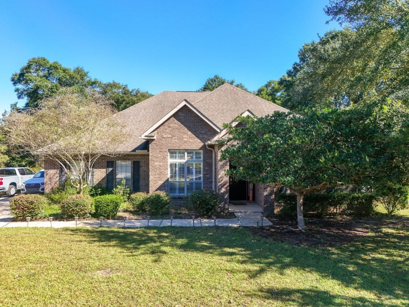 Indulge in breathtaking views of a peaceful natural pond from - Beach Home for sale in Freeport, Florida on Beachhouse.com