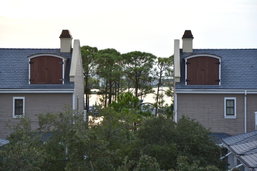 Watch the sunset on the Bay from this  condo's extensive veranda - Beach Condo for sale in Miramar Beach, Florida on Beachhouse.com