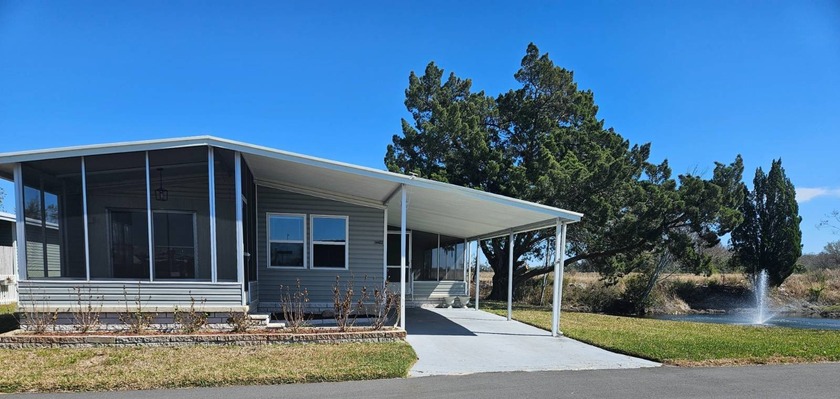 Completely Remodeled Home in a Resort-Style 55+ Community  This - Beach Home for sale in Hudson, Florida on Beachhouse.com