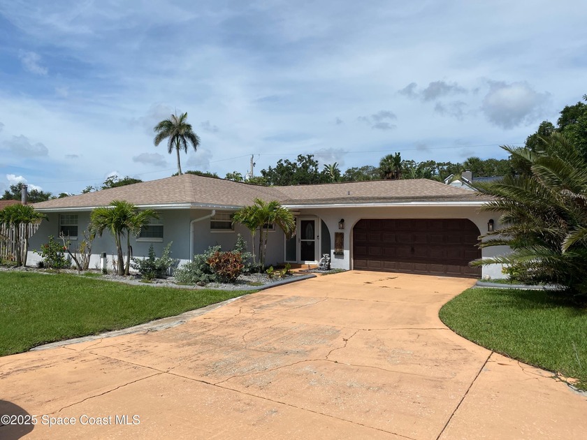Completely updated 4-bed / 2-bath concrete block home with - Beach Home for sale in Indian Harbour Beach, Florida on Beachhouse.com