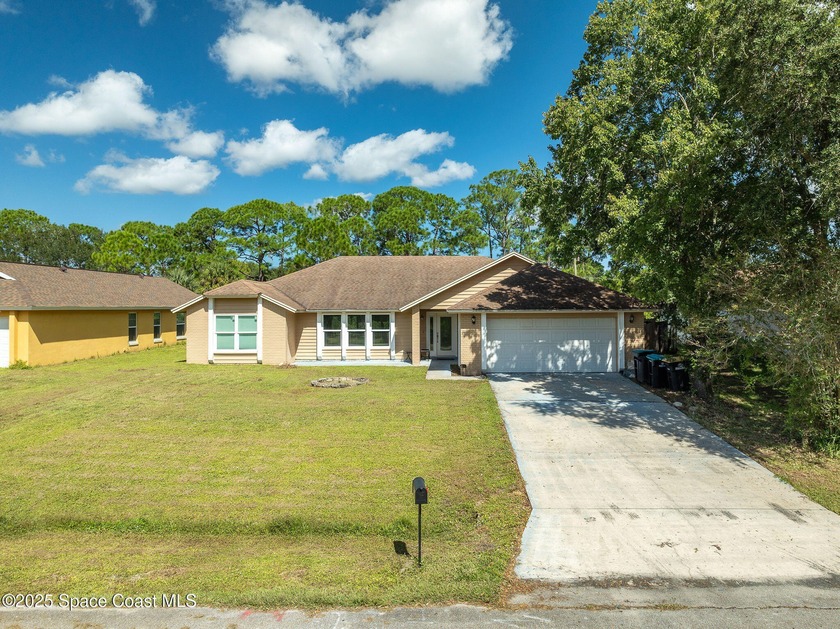 Amazing opportunity to own this updated pool home on city water - Beach Home for sale in Palm Bay, Florida on Beachhouse.com