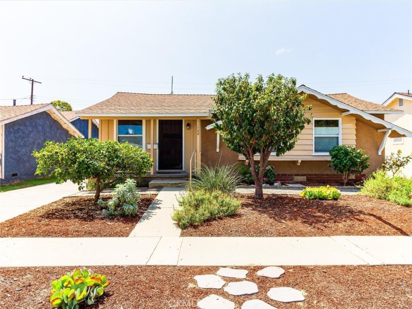 Welcome to this beautifully maintained 4-bedroom, 2-bathroom - Beach Home for sale in Lakewood, California on Beachhouse.com