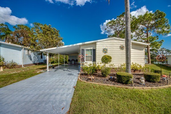 This beautiful, move-in-ready two-bedroom, two-bath home is - Beach Home for sale in North Fort Myers, Florida on Beachhouse.com