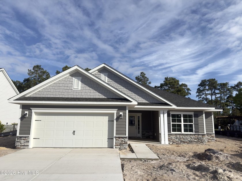 Welcome to Rutledge! The community features a swimming pool - Beach Home for sale in Shallotte, North Carolina on Beachhouse.com