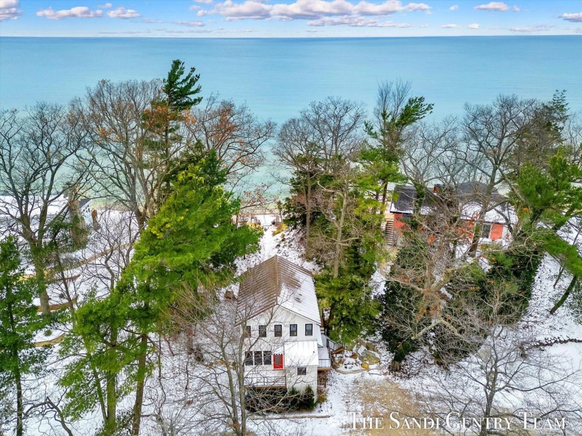 Discover this stunning 3-bedroom 3.5 bathroom Lake Michigan - Beach Home for sale in Mears, Michigan on Beachhouse.com