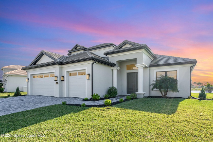 Nearly new 2024-built home in Viera's exclusive Laurasia! This - Beach Home for sale in Melbourne, Florida on Beachhouse.com