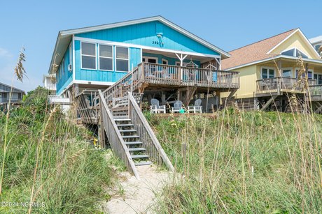 LOWEST PRICED 4-BEDROOM OCEANFRONT ON OAK ISLAND!! FURNISHED - Beach Home for sale in Oak Island, North Carolina on Beachhouse.com