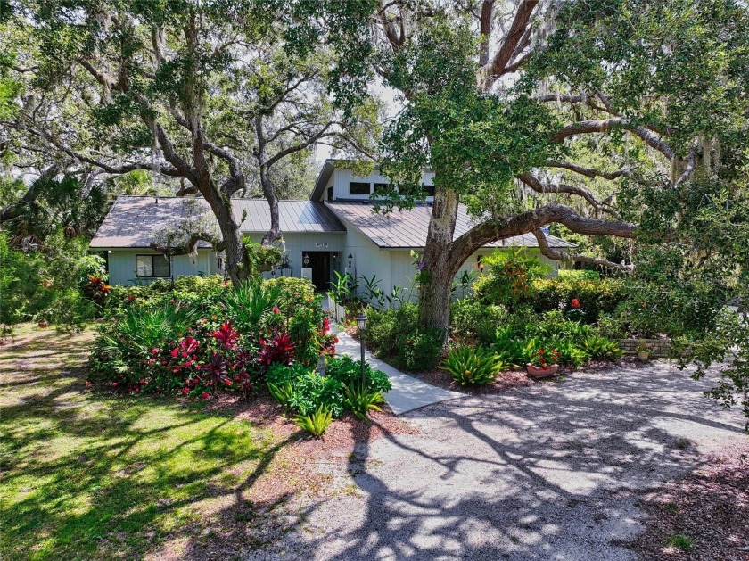 Discover your own acre of paradise in the serene Hidden Oaks - Beach Home for sale in Sarasota, Florida on Beachhouse.com