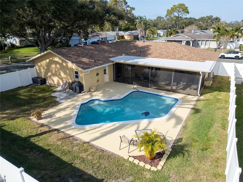 Welcome to this beautifully maintained 3-bedroom, 2-bath pool - Beach Home for sale in Seminole, Florida on Beachhouse.com