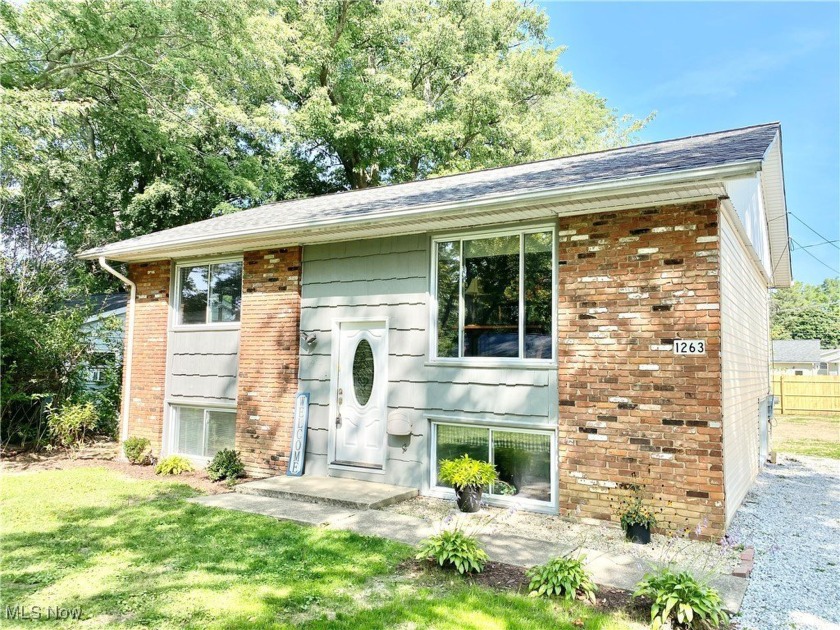 Wow! Great 4 bedroom, 2 bath updated Bi-level on a double lot in - Beach Home for sale in Madison, Ohio on Beachhouse.com