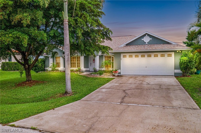 This beautiful lakefront pool home, perfectly located in the - Beach Home for sale in Fort Myers, Florida on Beachhouse.com