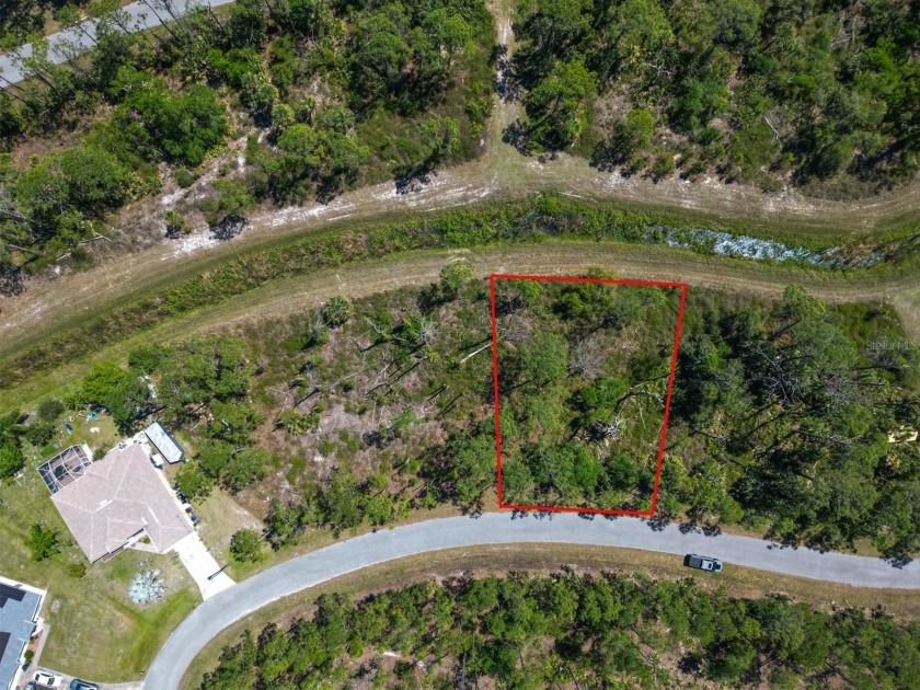 This vacant lot is tucked away on a secluded greenbelt in North - Beach Lot for sale in North Port, Florida on Beachhouse.com
