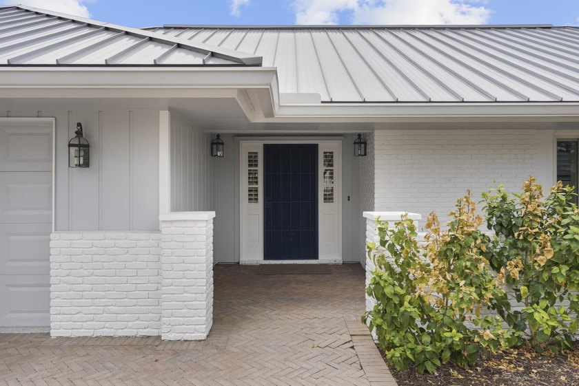 Located in the highly desirable Mariner Sands Country Club, this - Beach Home for sale in Stuart, Florida on Beachhouse.com