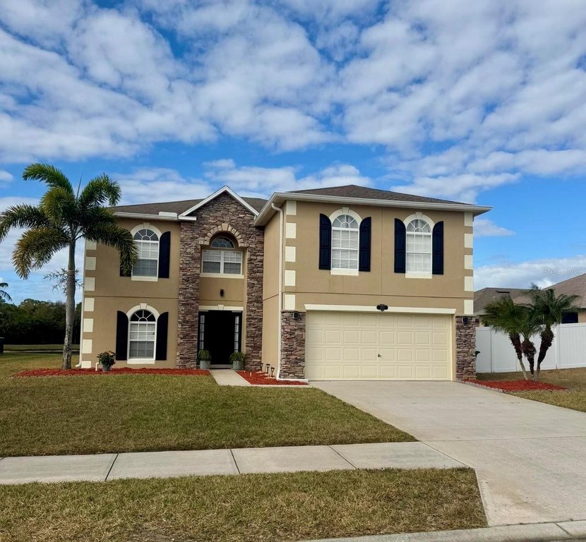 Stunning lakefront two stories single family home in the very - Beach Home for sale in Cocoa, Florida on Beachhouse.com