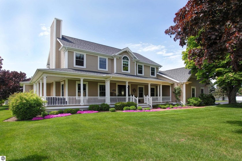 Pride of ownership and a meticulous attention to detail and - Beach Home for sale in Williamsburg, Michigan on Beachhouse.com