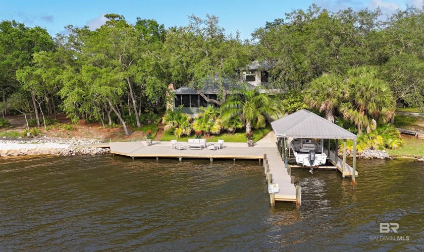 Escape to your own Private Paradise!  A 1.8 acre Waterfront - Beach Home for sale in Elberta, Alabama on Beachhouse.com