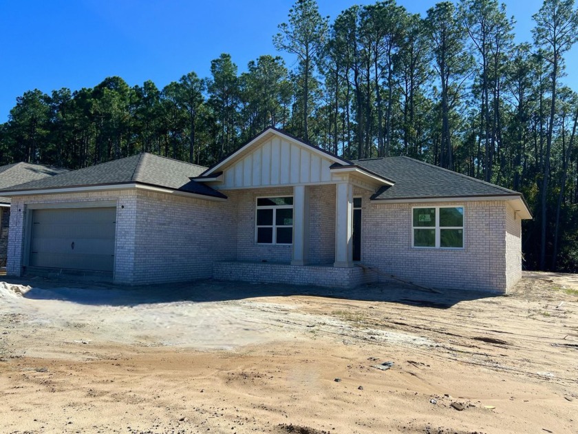 Your New Craftsman Built home awaits .Nestled amongst 3 other - Beach Home for sale in Navarre, Florida on Beachhouse.com