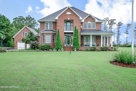 A lovely retreat wrapped in commercial grade fencing and gates - Beach Home for sale in Camden, North Carolina on Beachhouse.com