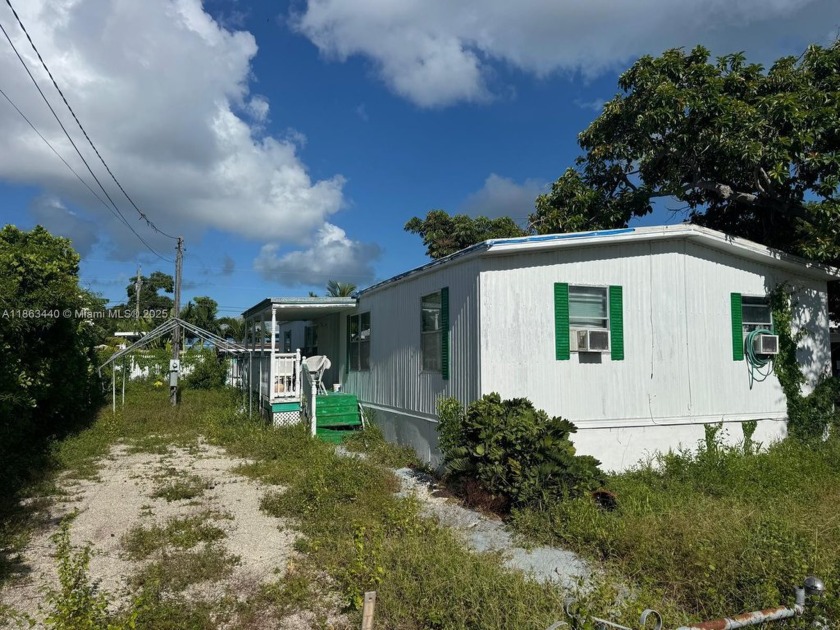 Opportunity awaits in Key Largo! This property is being sold - Beach Home for sale in Key Largo, Florida on Beachhouse.com