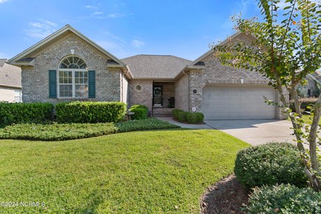 Discover your dream home in this beautifully updated residence - Beach Home for sale in Leland, North Carolina on Beachhouse.com