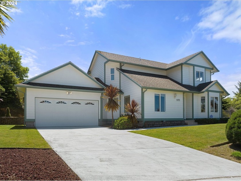 Nestled on a desirable corner lot, this charming 3-bedroom, 2 - Beach Home for sale in Coos Bay, Oregon on Beachhouse.com