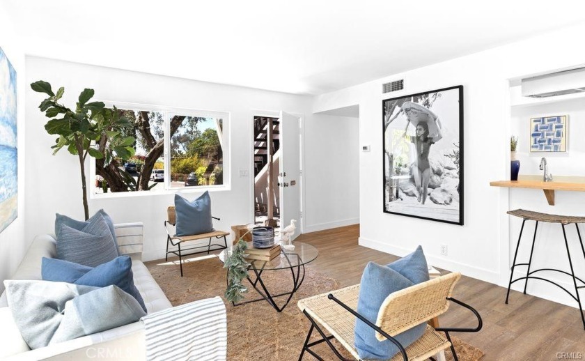 Refreshed and ready for move-in, this exceptional duplex at the - Beach Home for sale in Laguna Beach, California on Beachhouse.com