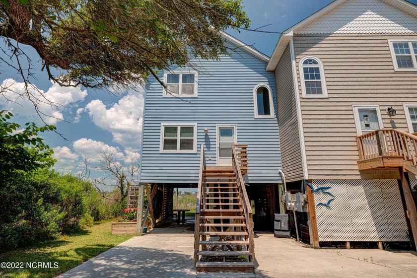 Welcome to 316 Bay Circle, a stunning waterfront retreat nestled - Beach Townhome/Townhouse for sale in North Topsail Beach, North Carolina on Beachhouse.com