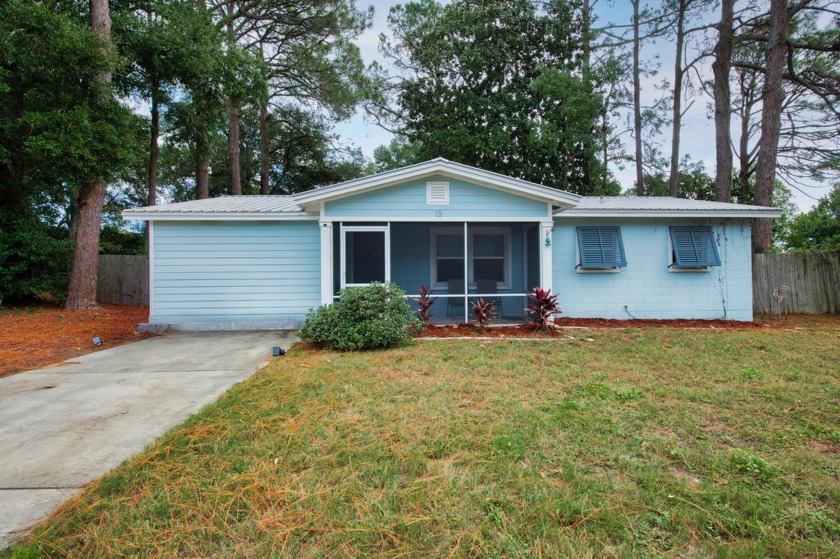 This beautifully renovated home offers a perfect blend of modern - Beach Home for sale in Fort Walton Beach, Florida on Beachhouse.com