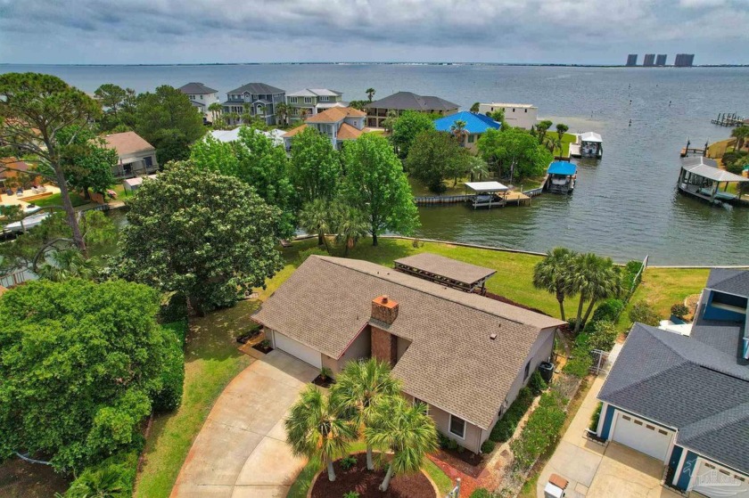 Tucked away in one of Gulf Breeze's most desirable waterfront - Beach Home for sale in Gulf Breeze, Florida on Beachhouse.com