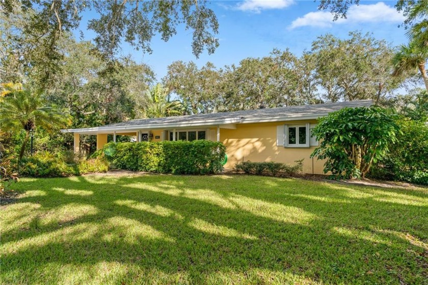 Well- loved, updated 4BR/3BA Central Beach home that sits on an - Beach Home for sale in Vero Beach, Florida on Beachhouse.com