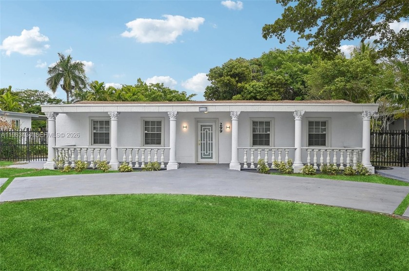 This stunning 3-bedroom, 2-bathroom waterfront home spans over 2 - Beach Home for sale in Miami, Florida on Beachhouse.com