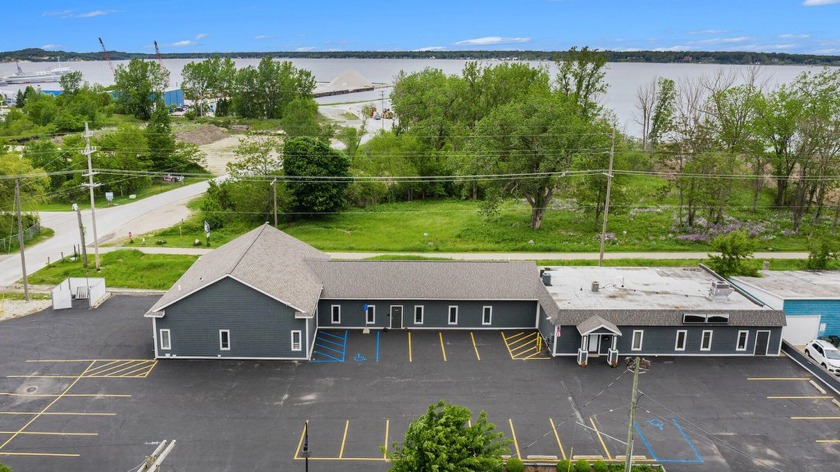 Unlock endless possibilities with this 8,000 sq ft commercial - Beach Commercial for sale in Muskegon, Michigan on Beachhouse.com