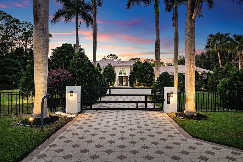 Nestled on 1.35 acres in the prestigious Sherbrooke Estates - Beach Home for sale in Lake Worth, Florida on Beachhouse.com