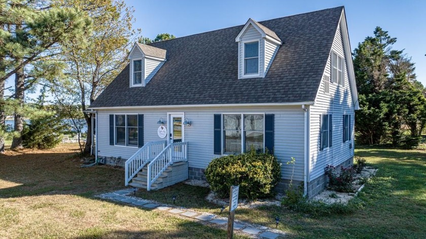 Welcome to Oyster Bay! This beautiful Cape Cod home on - Beach Home for sale in Onancock, Virginia on Beachhouse.com