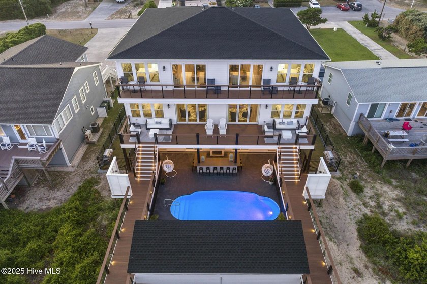 This OCEANFRONT ARCHITECTURAL MASTERPIECE in Emerald Isle, North - Beach Townhome/Townhouse for sale in Emerald Isle, North Carolina on Beachhouse.com