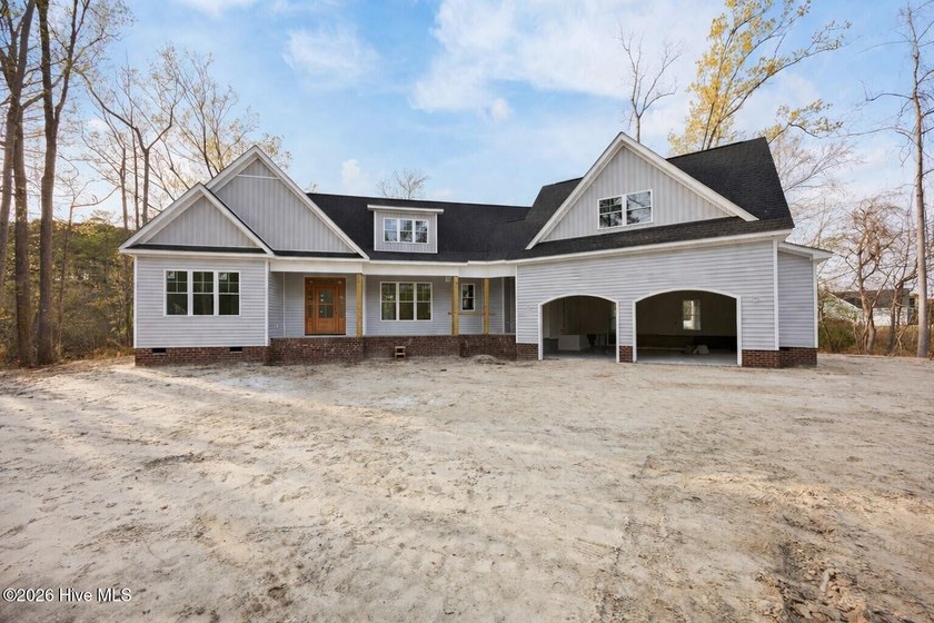 Tucked along the tranquil waterfront in the sought-after - Beach Home for sale in Elizabeth City, North Carolina on Beachhouse.com