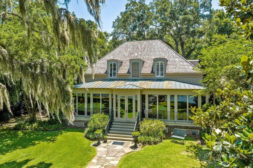 Nestled on nearly a 100ft lot with sweeping views of Mobile Bay - Beach Home for sale in Fairhope, Alabama on Beachhouse.com