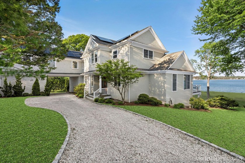 Nestled on a quiet cul-de-sac with breathtaking views of - Beach Home for sale in Hampton Bays, New York on Beachhouse.com
