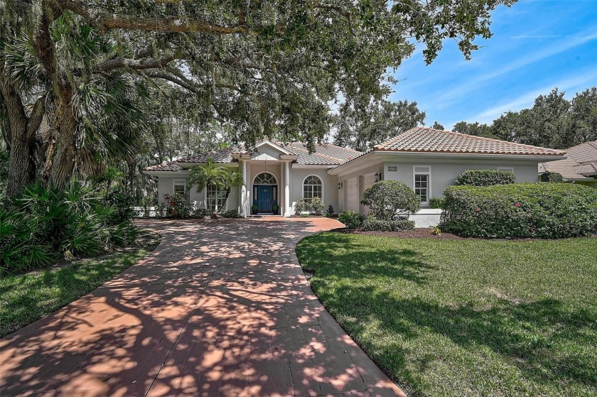 Step into Florida living with this exquisite home, offering over - Beach Home for sale in Nokomis, Florida on Beachhouse.com