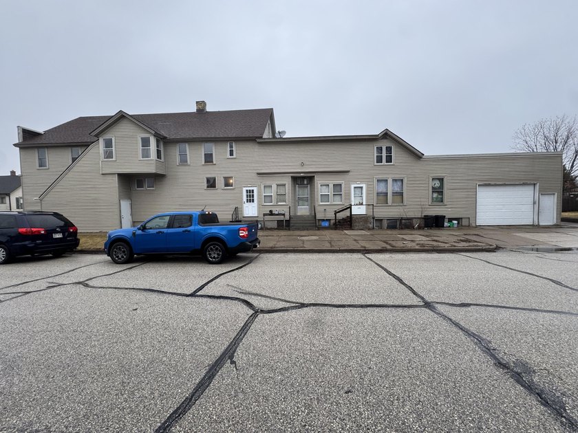 Versatile corner mixed-use property offering four 2BR/1BA - Beach Lot for sale in Sheboygan, Wisconsin on Beachhouse.com