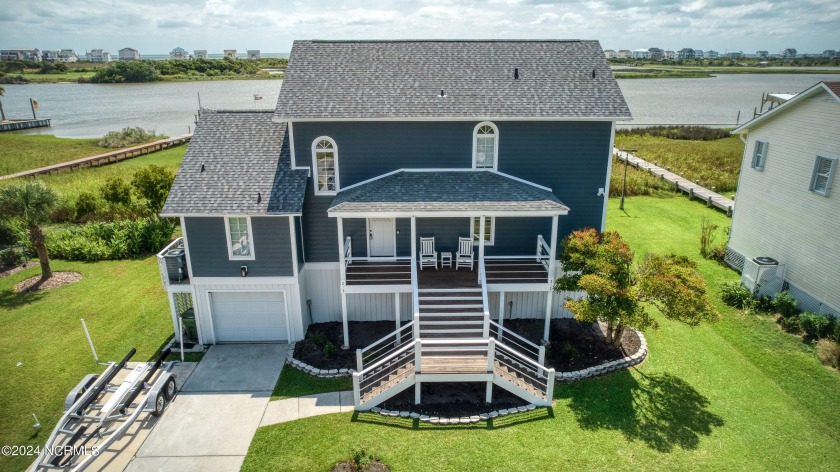 Immerse yourself in the epitome of waterfront living with this - Beach Home for sale in Sneads Ferry, North Carolina on Beachhouse.com