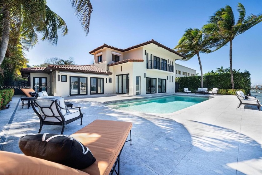 Nestled on the exclusive, gated island of Biscayne Point, this - Beach Home for sale in Miami Beach, Florida on Beachhouse.com