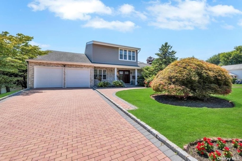 Welcome to this beautifully renovated colonial located in the - Beach Home for sale in Glen Cove, New York on Beachhouse.com