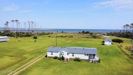 Nestled on the waterfront of Davis, North Carolina, this - Beach Home for sale in Davis, North Carolina on Beachhouse.com