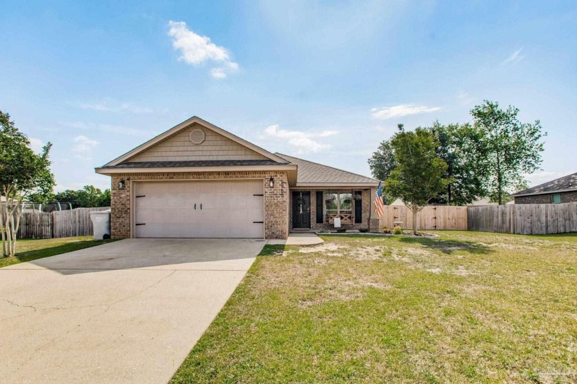 This delightful all-brick home is ready for its next chapter and - Beach Home for sale in Pace, Florida on Beachhouse.com