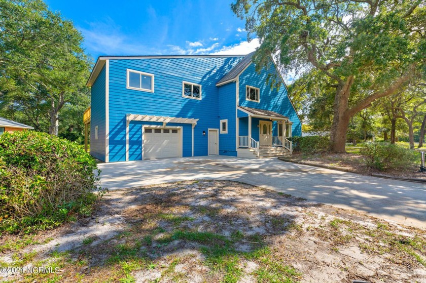 EXTENSIVLEY REMODELED & UPDATED home with Golf course views and - Beach Home for sale in Oak Island, North Carolina on Beachhouse.com