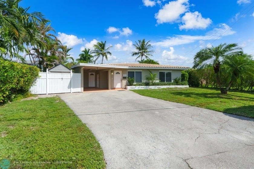 This 3 bdm 2 bth WATERFRONT POOL HOME in Royal Palm Acres - Beach Home for sale in Oakland Park, Florida on Beachhouse.com